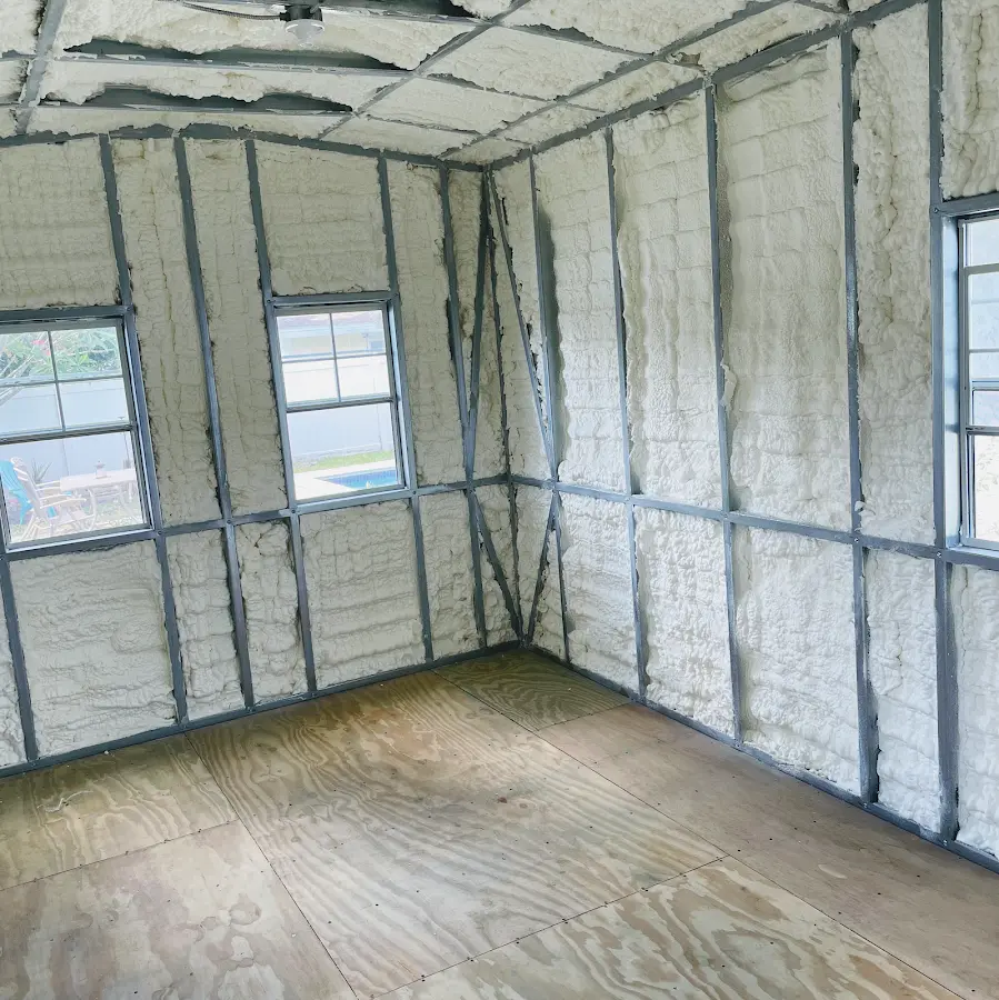 Closed-cell spray foam insulation applied to wall cavities in a residential project in Canton